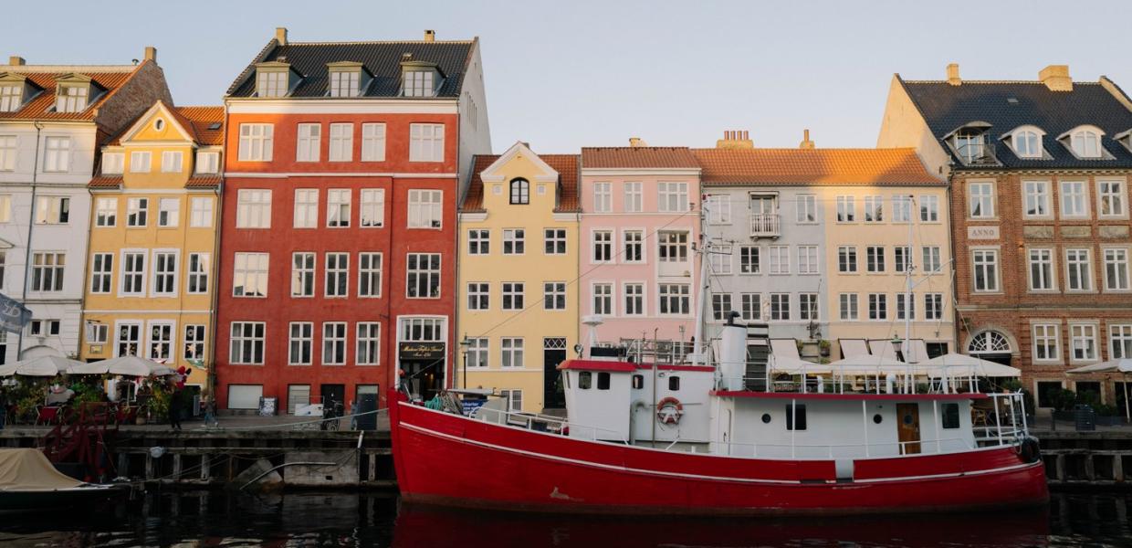 Boats and houses in Nyhavn in Copenhagen in autumn