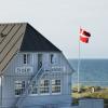 The outside of Svinkløv Badehotel, a beachside spa hotel in Denmark