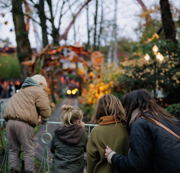 Family at Tivoli Gardens in central Copenhagen in autumn