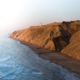 Rubjerg Knude Lighthouse view with cliffs and sea, North Jutland